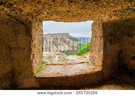 View Of The Mountain In The Window Of The Cave City Of Chufut-kale, Crimea, Russia