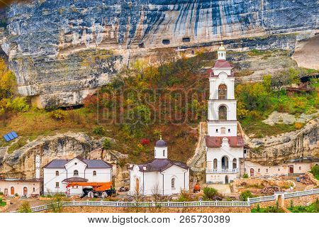 Beautiful Monastery In The Background Of A Rock With A Cave City In Chufut-kale, Crimea, Russia