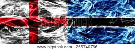 England Vs Botswana, Botswanan Smoke Flags Placed Side By Side. Thick Colored Silky Smoke Flags Of E