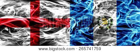 England Vs Guatemala, Guatemalan Smoke Flags Placed Side By Side. Thick Colored Silky Smoke Flags Of