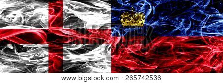 England Vs Liechtenstein, Liechtensteins Smoke Flags Placed Side By Side. Thick Colored Silky Smoke 