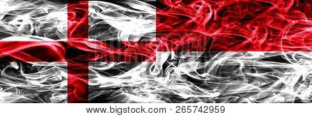 England Vs Monaco, Monacan Smoke Flags Placed Side By Side. Thick Colored Silky Smoke Flags Of Engli