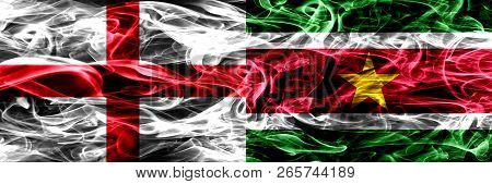 England Vs Suriname, Surinamese Smoke Flags Placed Side By Side. Thick Colored Silky Smoke Flags Of 