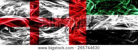 England Vs United Arab Emirates, Emirati Smoke Flags Placed Side By Side. Thick Colored Silky Smoke 