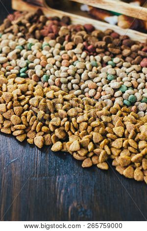 Dry Pet Food For Dogs And Cats On Table.