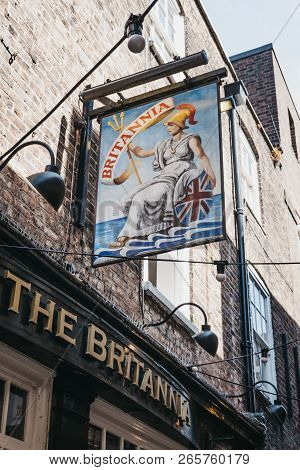 London, Uk - March 10, 2018: Sign At The Entrance Of The Brittania Pub In Richmond, A Suburban Town 