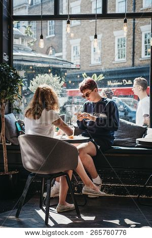 London, Uk - August 1, 2018; People Inside Joe & The Juice Cafe In Richmond, London. Joe & The Juice