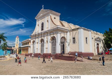 Trinidad, Cuba - Feb 8, 2016: Tourists In Front Of Iglesia Parroquial De La Santisima Trinidad Churc