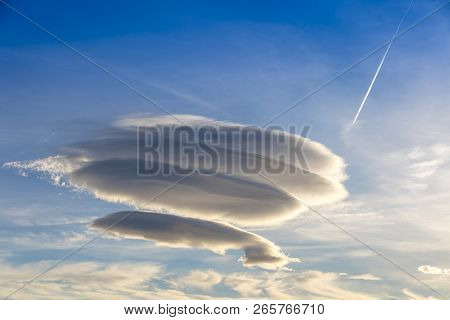 Large Circular Cloud Forms (altocumulus Lenticularis Duplicatus V-39) In The Evening Sky Over Malaga