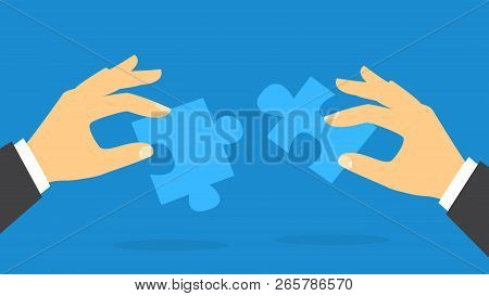 Hand Holding Jigsaw Puzze Piece. Idea Of Solution