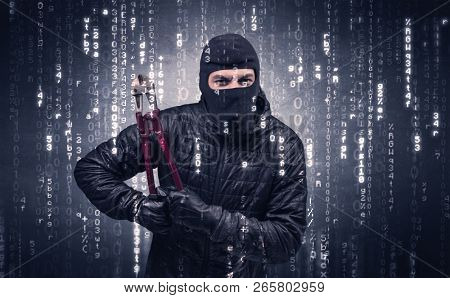Burglar in action with encoded concept and his tools in his hand. 