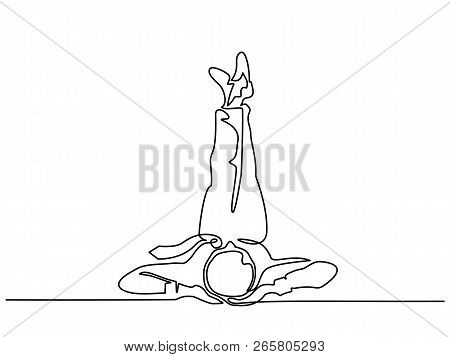 Young Man Relaxing Lying On Floor Legs Up