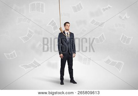 Young burnout businessman with flying documents concept