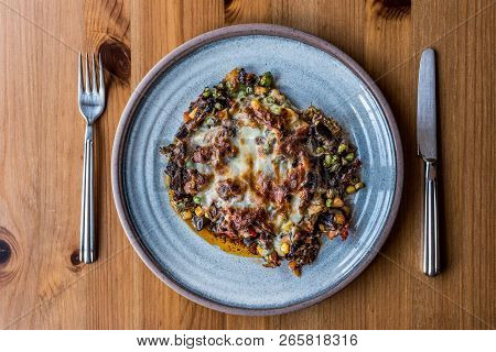 Macar Kebabi / Hungarian Food With Minced Meat , Melted Cheese And Vegetables.