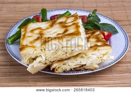 Turkish Style Meat And Cheese Stuffed Filo Dough Borek Served Su Boregi
