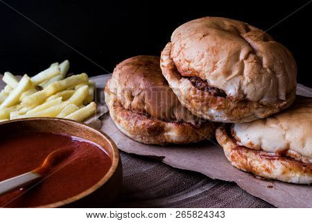 Turkish Wet Burger With Sauce And Potatoes. / Islak Hamburger