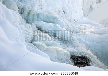 frozen waterfall Tannforsen in winter, Sweden