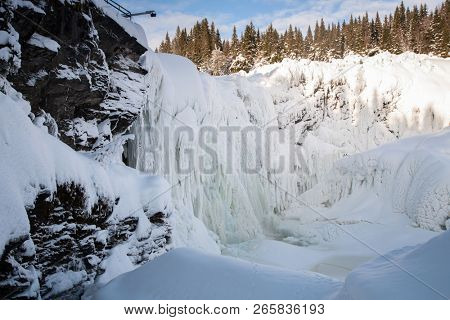 frozen waterfall Tannforsen in winter, Sweden