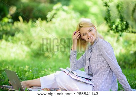 Managing Business Remote Outdoors. Woman With Laptop Sit Grass Meadow. Best Jobs To Work Remotely. S