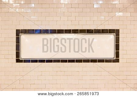 White Rectangular Panel With Copyspace On A Tiled Wall