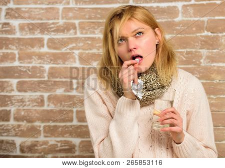 Take Medications To Reduce Fever. Woman Tousled Hair Scarf Hold Glass Water And Tablets Blister. Gir