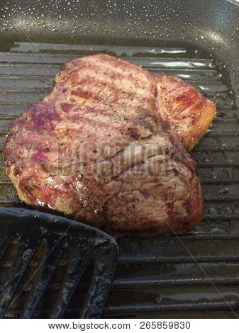 Piece Of Roast Beef Steak Cooking For Lunch