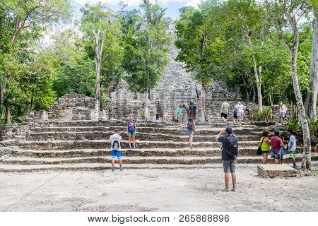 Coba, Mexico - March 1, 2016: Tourist Visit The Pyramid Called The Church La Iglesia At The Ruins Of