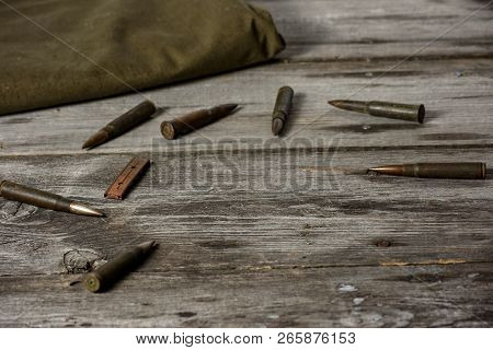 7, 92 X 57 - Rustic Ammos And Poncho Lies On The Wooden Background