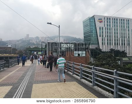 Medellin, Antioquia, Colombia - 10/08/2018: People Walking On The Access Bridge To The Industriales 