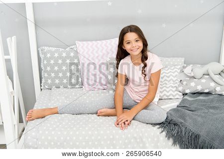 Cute And Adorable. Little Girl Relax On Bed. Happy Little Girl. Childhood Years. One Of The Luckiest