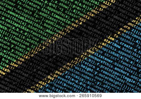 Tanzania Flag  Is Depicted On The Screen With The Program Code. The Concept Of Modern Technology And