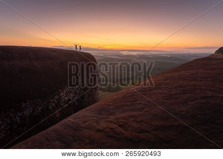 The Success Of Lovers On  Tree Rock Whale Mountain In Bungkan, Couple In Thailand