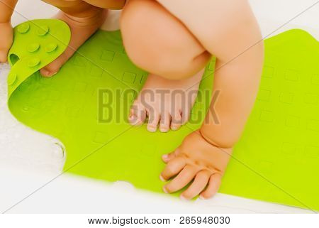 Baby Feet In Bathtub On Anti Slip Rubber Mat For Bathroom