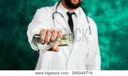 Doctor Holding Dollar Bills Close Up, Corrupcy Abstract
