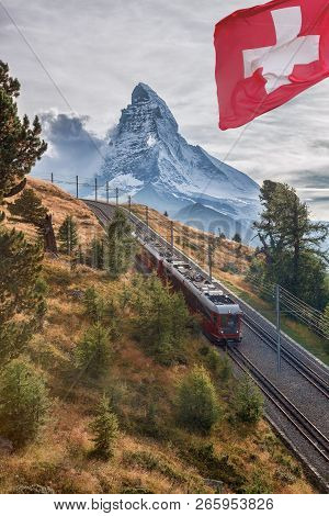 Famous Matterhorn Peak With Gornergrat Train In Zermatt Area, Switzerland