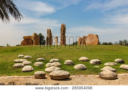 Stone Pillars Stand In A Circle In A Park In Israel