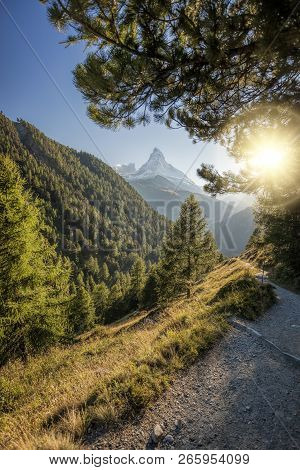 Famous Matterhorn Peak Against Sunset In Zermatt Area, Switzerland