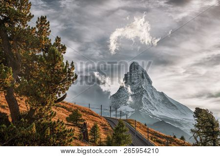 Matterhorn Peak With Railway Against Sunset In Swiss Alps, Switzerland