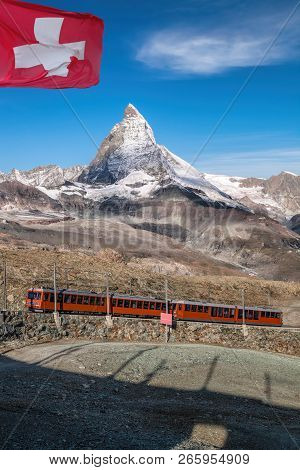 Famous Matterhorn Peak With Gornergrat Train In Zermatt Area, Switzerland