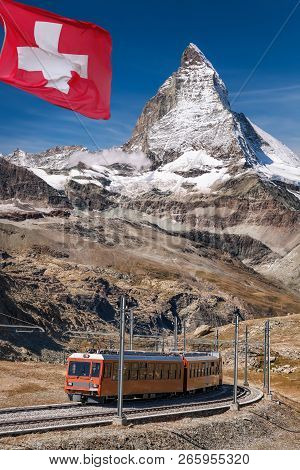 Famous Matterhorn Peak With Gornergrat Train In Zermatt Area, Switzerland