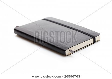 Black moleskine isolated over white.