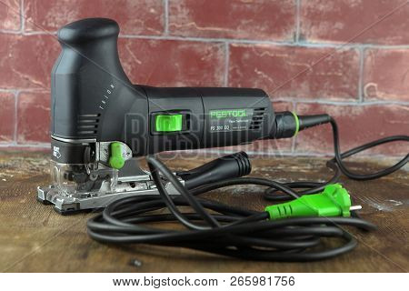 Moscow, Russia, August 15, 2018. Electric Jig Saw Festool Trion Ps 300 Eq On A Wooden Table Against 