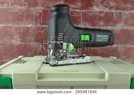 Moscow, Russia, August 15, 2018. Electric Jig Saw Festool Trion Ps 300 Eq On A Wooden Table Against 