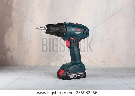 Moscow, Russia, August 30, 2018. 18v Lithium-ion Cordless Drill-drivers Bosch Gsr 1800-li Against Th