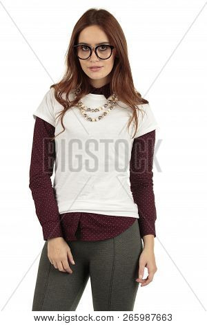 Cute Smiling Preppy, Fashion Geek Girl In A White T-shirt And Maroon Blouse