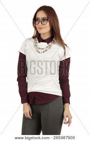 Cute Smiling Preppy, Fashion Geek Girl In A White T-shirt And Maroon Blouse