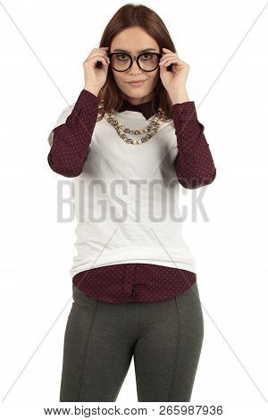 Cute Smiling Preppy, Fashion Geek Girl In A White T-shirt And Maroon Blouse