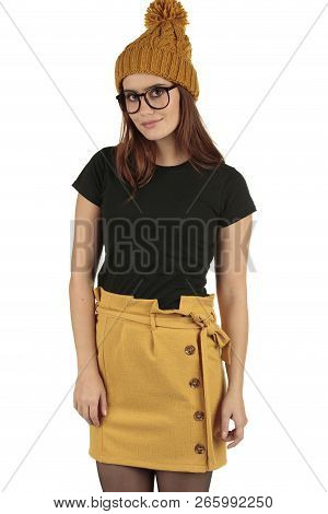 Cute Smiling Preppy, Fashion Geek Girl In A Black T-shirt And Yellow Skirt