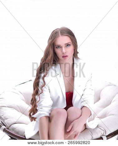 Close Up. Portrait Of Sexy Young Woman In Lingerie Sitting In Papasan Chair