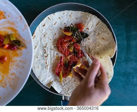 Cooking Pita Rolls Stuffed With Vegetables. Stuffing For Tacos. Eastern Cuisine. Pita Bread In A Pan